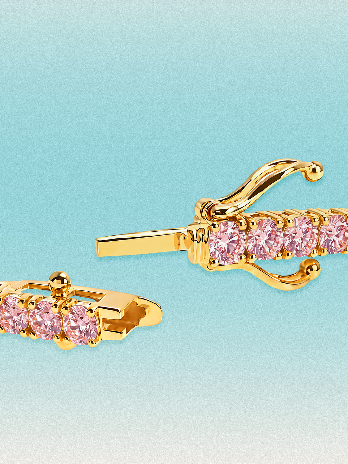 Clasp detail of a Bow Tie Lab Diamonds Fancy Pink Round 4-Prong 7-inch lab-grown diamond tennis bracelet in 14K yellow gold.