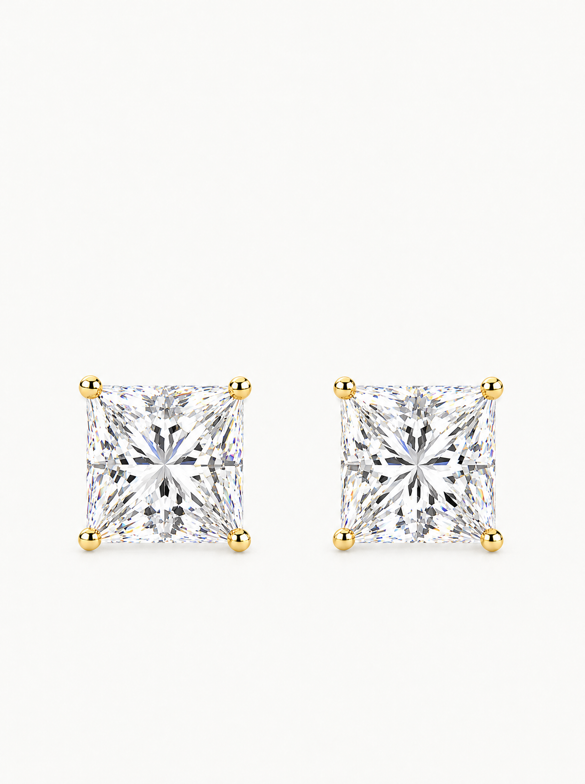 Princess Cut Lab-Grown Diamond Stud Earrings in 14K yellow gold, angled side view — Bow Tie Lab Diamonds