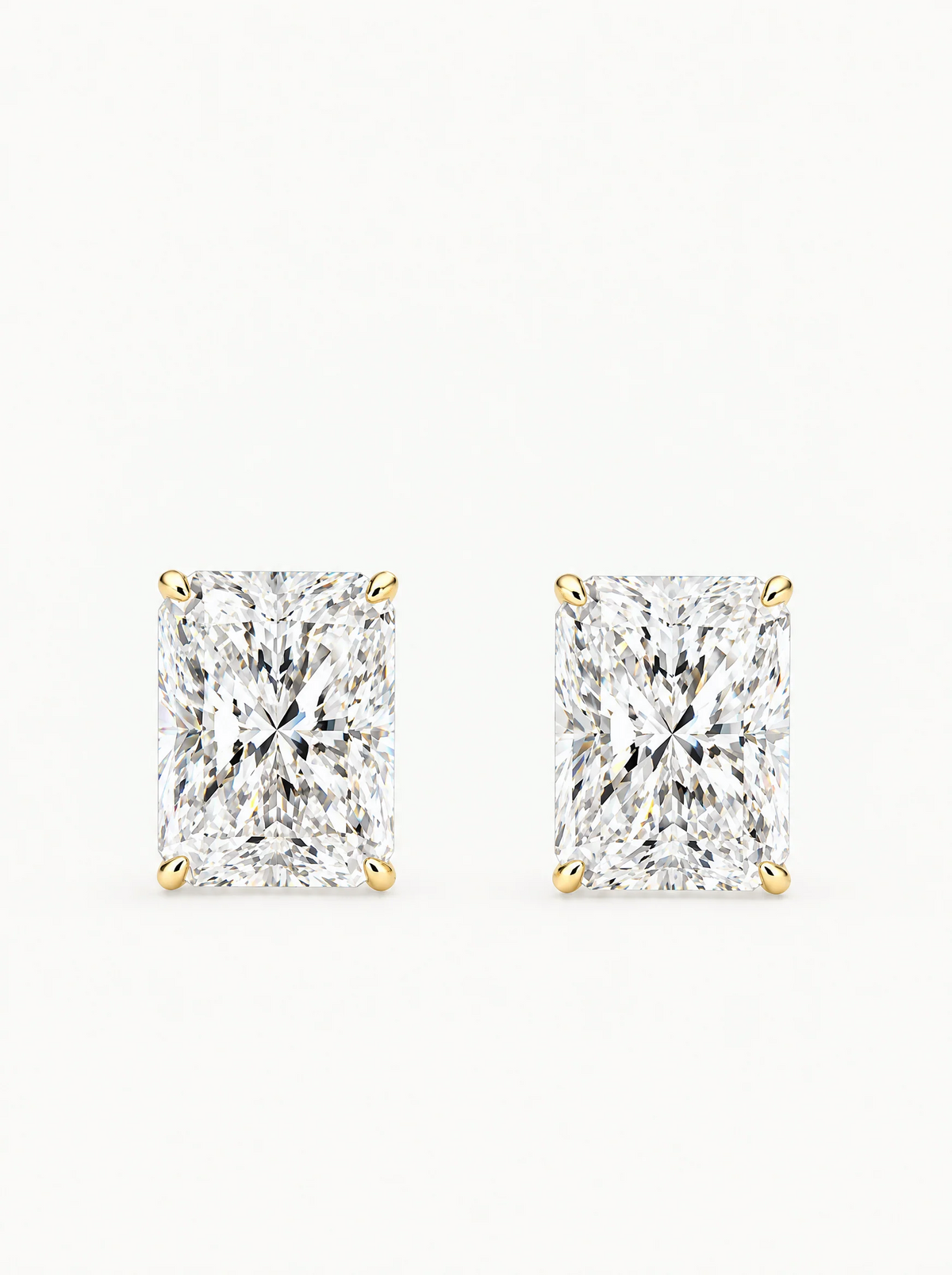 Radiant Cut Lab-Grown Diamond Stud Earrings in 14K yellow gold, angled side view — Bow Tie Lab Diamonds