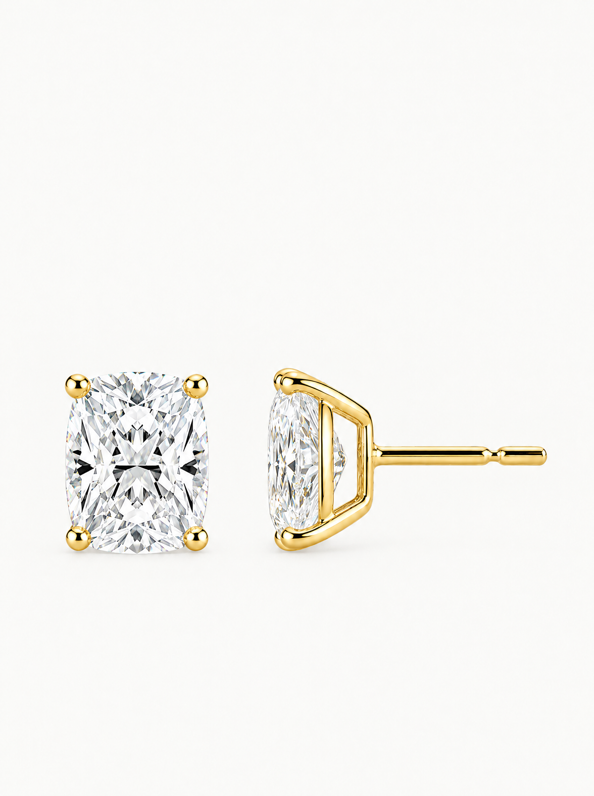 Cushion Cut Lab-Grown Diamond Stud Earrings in 14K yellow gold, angled side view — Bow Tie Lab Diamonds