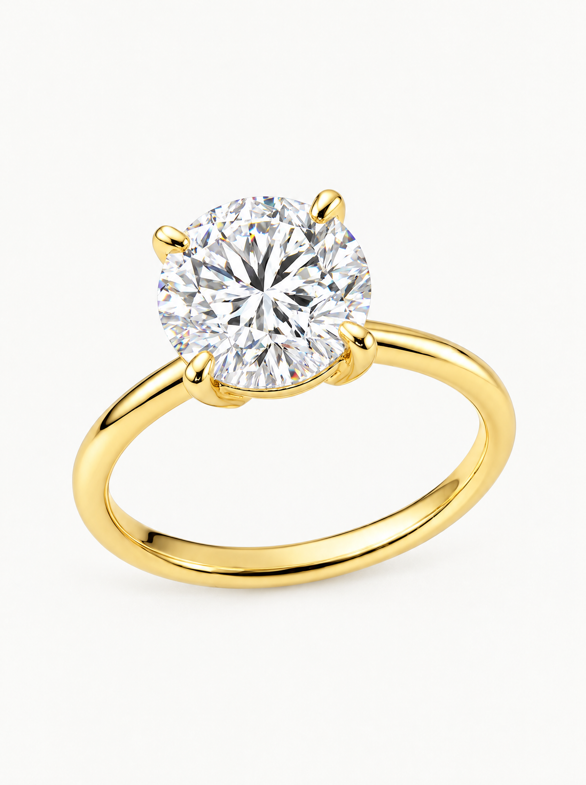 Round Cut 4-Prong Solitaire Lab-Grown Diamond Engagement Ring in 14K yellow gold, angled side view — Bow Tie Lab Diamonds