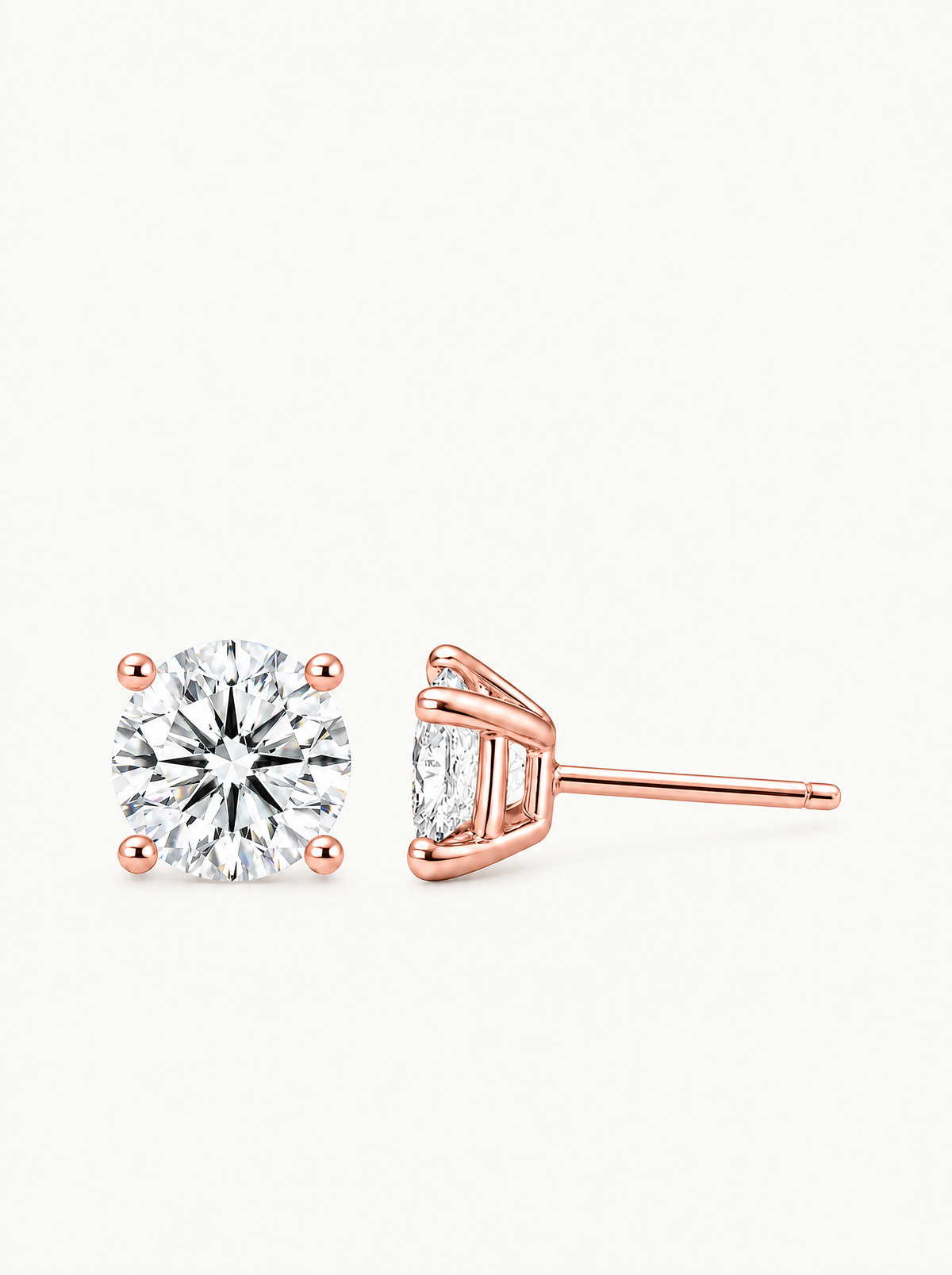 Round Cut 4-Prong Lab-Grown Diamond Stud Earrings in 14K rose gold, front view — Bow Tie Lab Diamonds