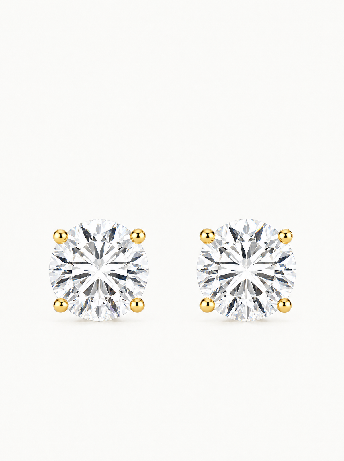 Round Cut 4-Prong Lab-Grown Diamond Stud Earrings in 14K yellow gold, front view — Bow Tie Lab Diamonds