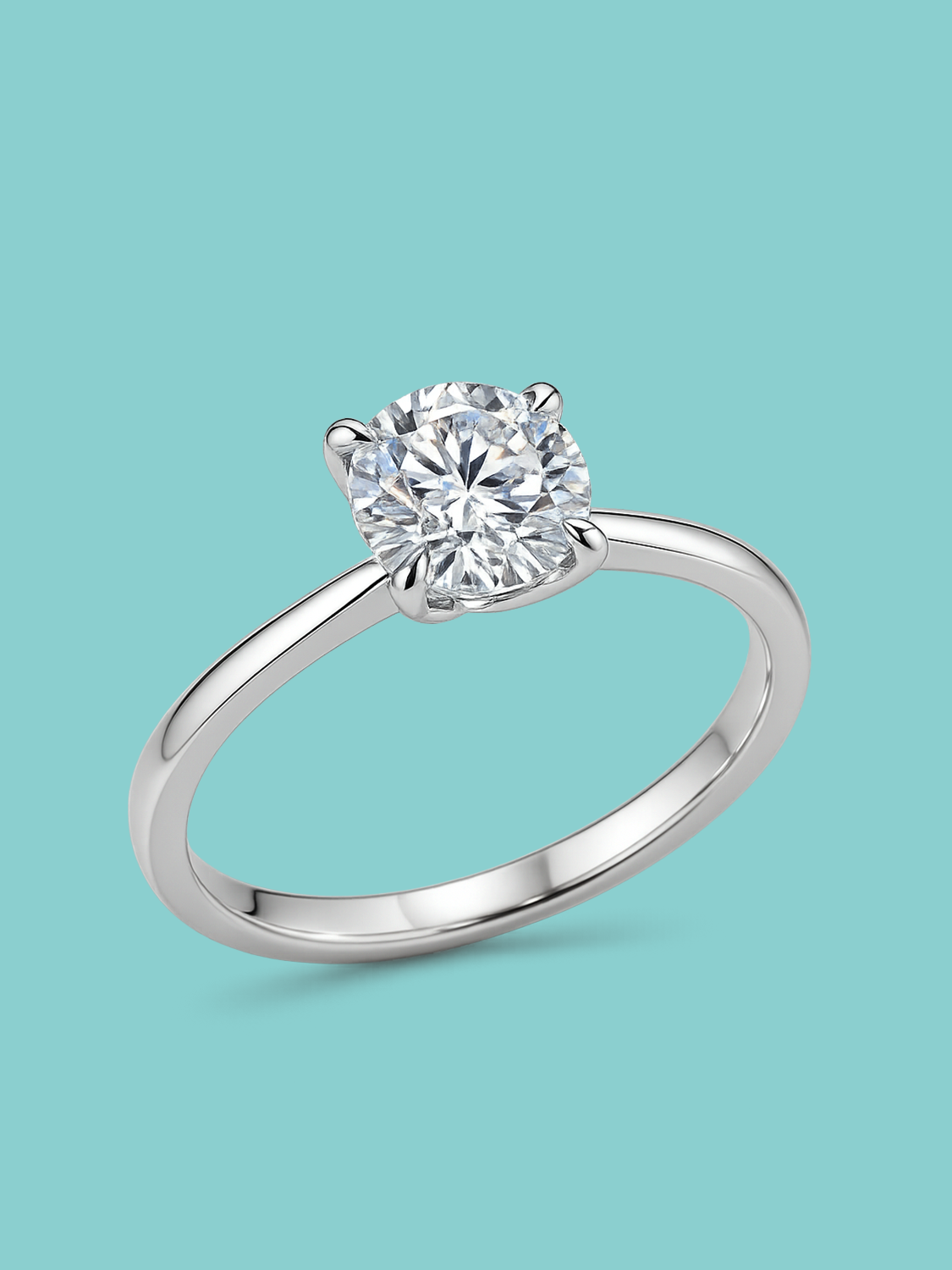 Round 4 prong Engagement Ring