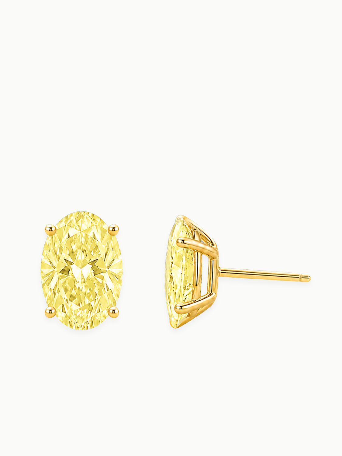 Fancy Yellow Oval Cut Lab-Grown Diamond Stud Earrings in 14K yellow gold, angled side view — Bow Tie Lab Diamonds