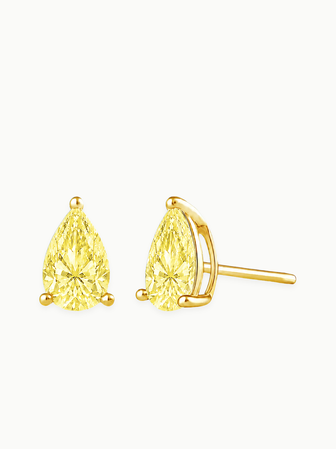 Fancy Yellow Pear Cut Lab-Grown Diamond Stud Earrings in 14K yellow gold, angled side view — Bow Tie Lab Diamonds