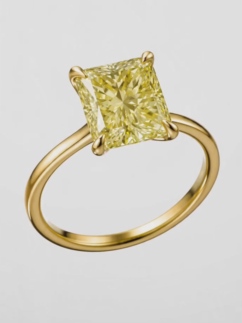 Video of the Fancy Yellow Radiant Cut Solitaire Lab-Grown Diamond Engagement Ring, showing sparkle and movement — Bow Tie Lab Diamonds