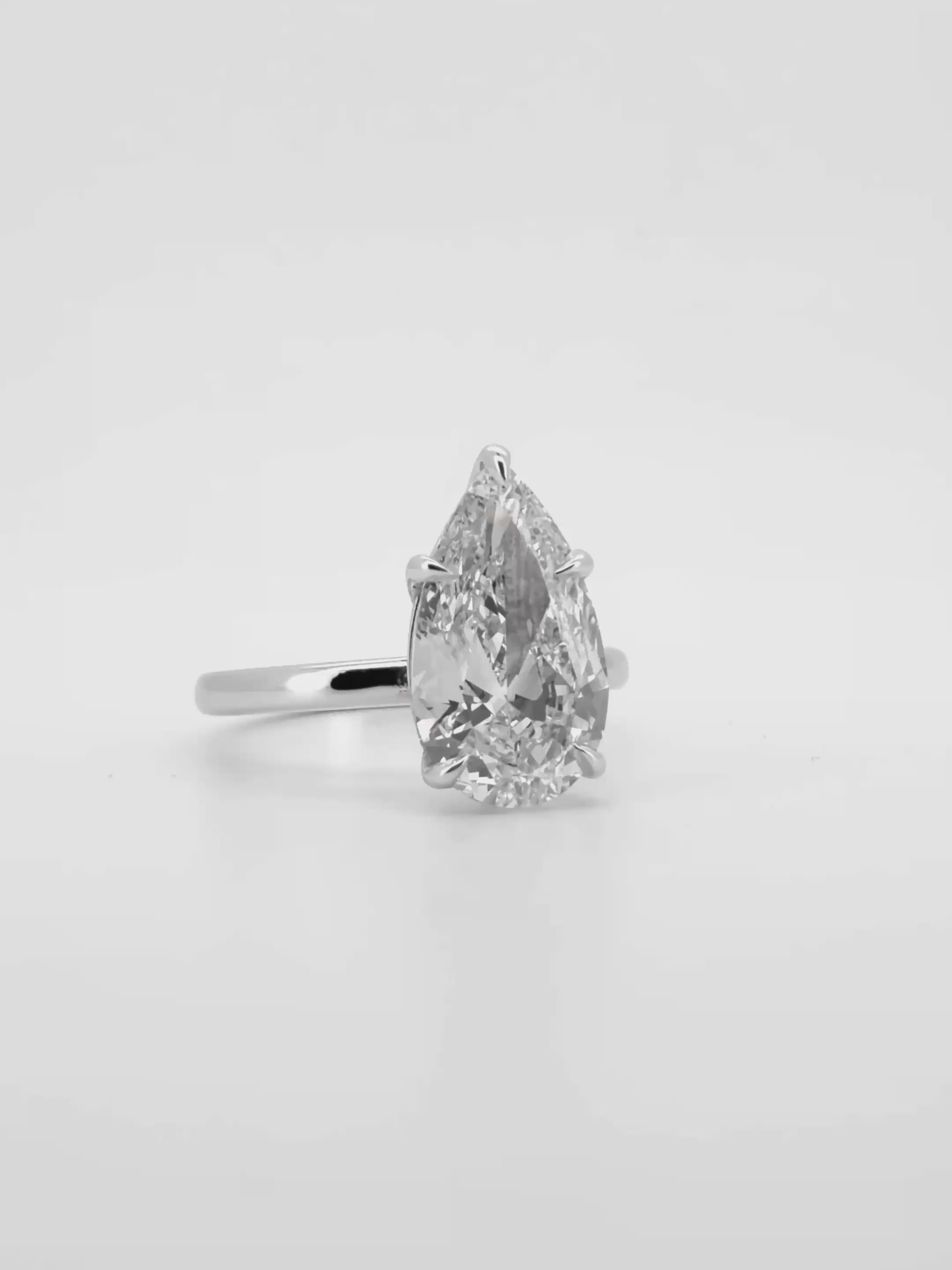 Load video: Pear Cut Solitaire Lab Diamond Engagement Ring