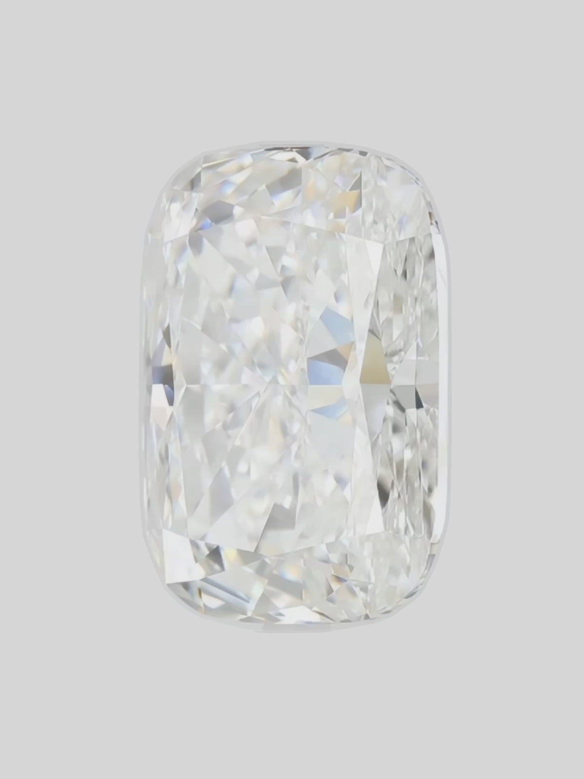 Load video: Rotating video of a colorless cushion cut lab-grown diamond showing its sparkle — Bow Tie Lab Diamonds