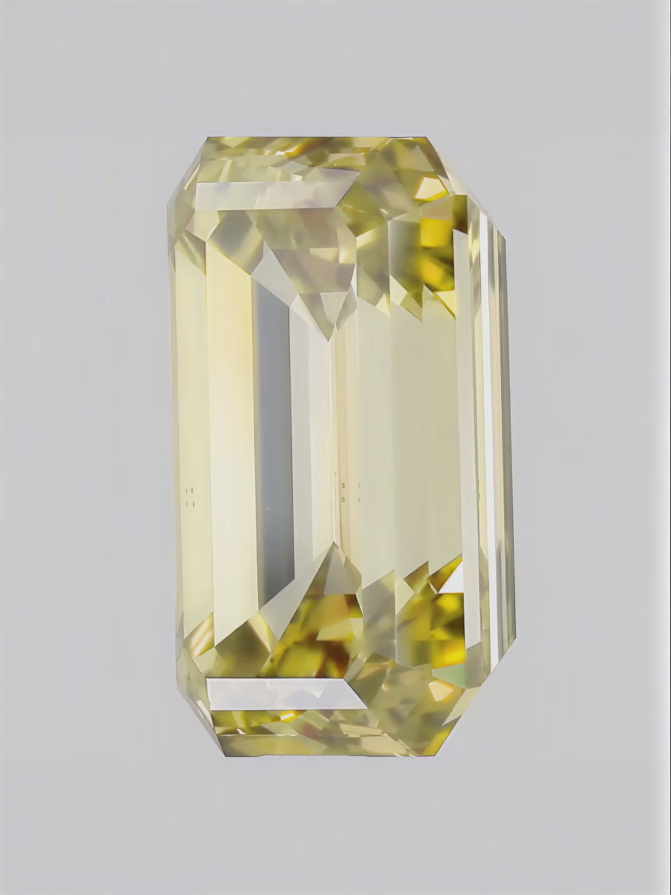 Load video: Fancy Yellow Emerald Cut Lab Grown Diamond Stud Earrings