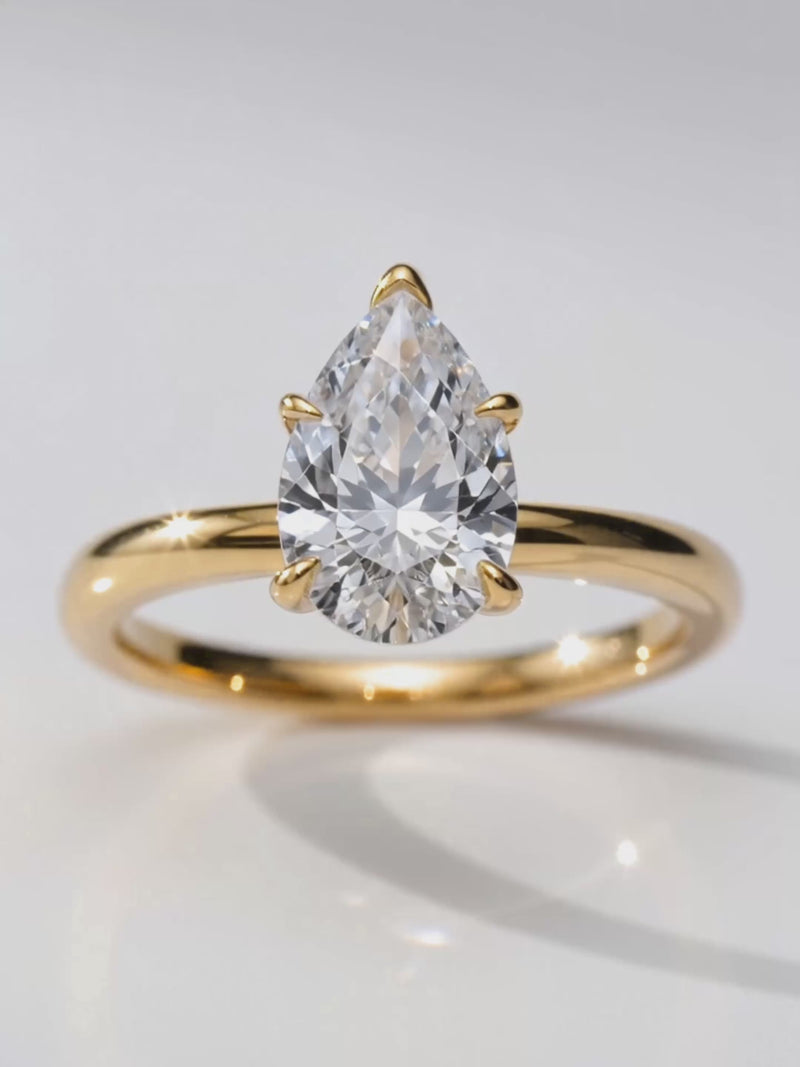 Video of the Pear Cut Solitaire Lab-Grown Diamond Engagement Ring, showing sparkle and movement — Bow Tie Lab Diamonds