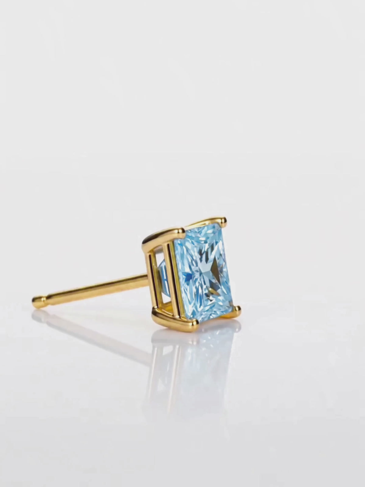 Load video: Video of the Fancy Blue Princess Cut Lab-Grown Diamond Stud Earrings, showing sparkle and movement — Bow Tie Lab Diamonds