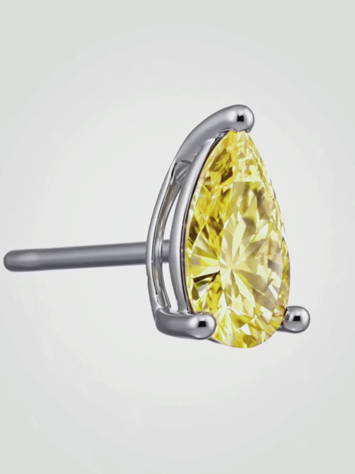 Load video: Video of the Fancy Yellow Pear Cut Lab-Grown Diamond Stud Earrings, showing sparkle and movement — Bow Tie Lab Diamonds