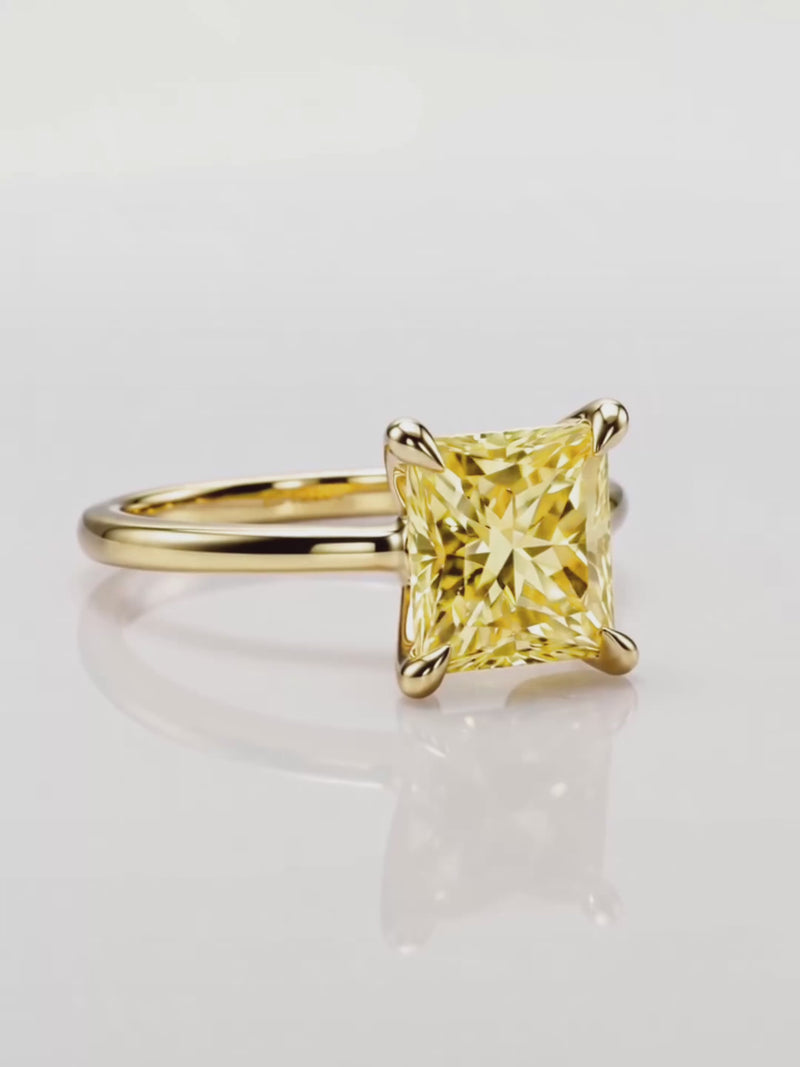 Video of the Fancy Yellow Princess Cut Solitaire Lab-Grown Diamond Engagement Ring, showing sparkle and movement — Bow Tie Lab Diamonds