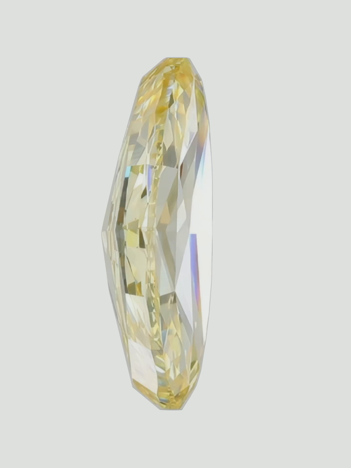 Load video: Rotating video of a fancy yellow marquise cut lab-grown diamond showing its sparkle — Bow Tie Lab Diamonds