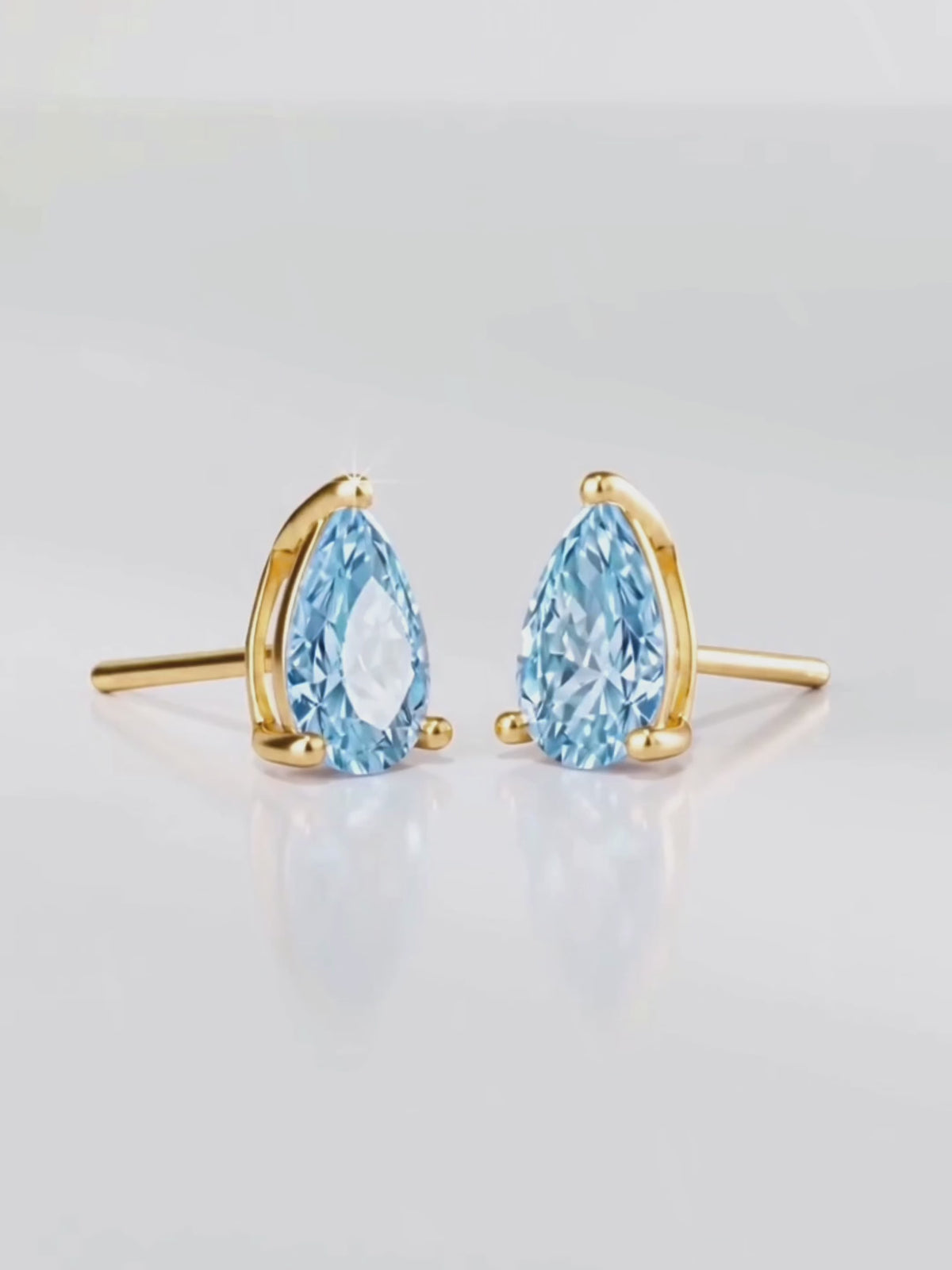 Load video: Video of the Fancy Blue Pear Cut Lab-Grown Diamond Stud Earrings, showing sparkle and movement — Bow Tie Lab Diamonds
