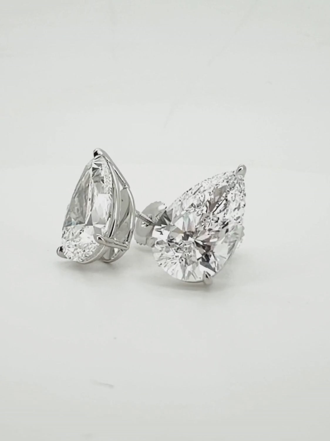 Load video: Video of the Pear Cut Lab-Grown Diamond Stud Earrings, showing sparkle and movement — Bow Tie Lab Diamonds