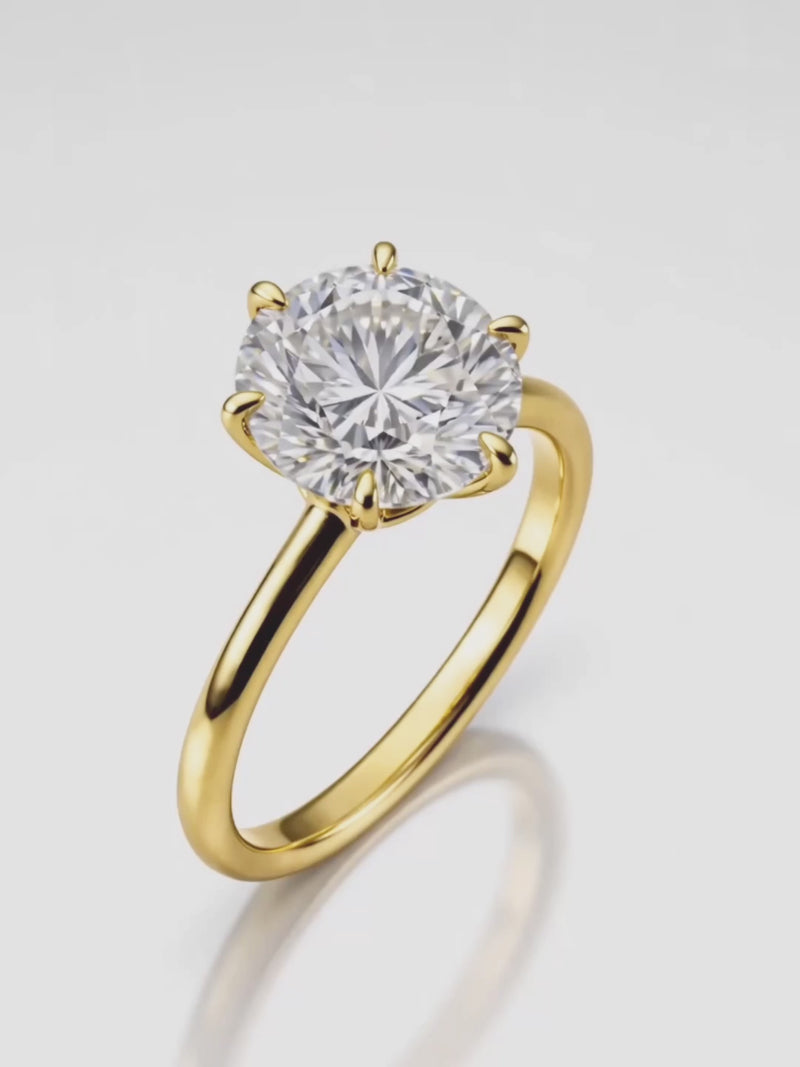 Video of the Round Cut 6-Prong Solitaire Lab-Grown Diamond Engagement Ring, showing sparkle and movement — Bow Tie Lab Diamonds