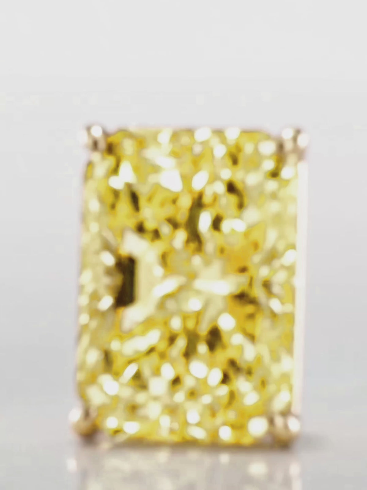 Load video: Video of the Fancy Yellow Radiant Cut Lab-Grown Diamond Stud Earrings, showing sparkle and movement — Bow Tie Lab Diamonds