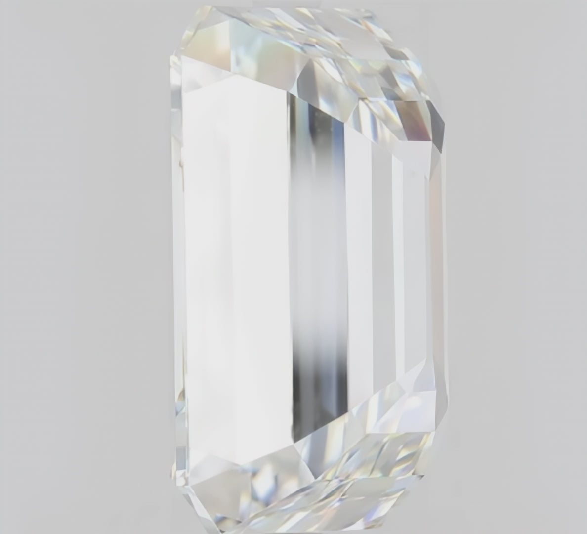 Load video: Emerald Cut Bold Side Stone Lab Diamond Engagement Ring