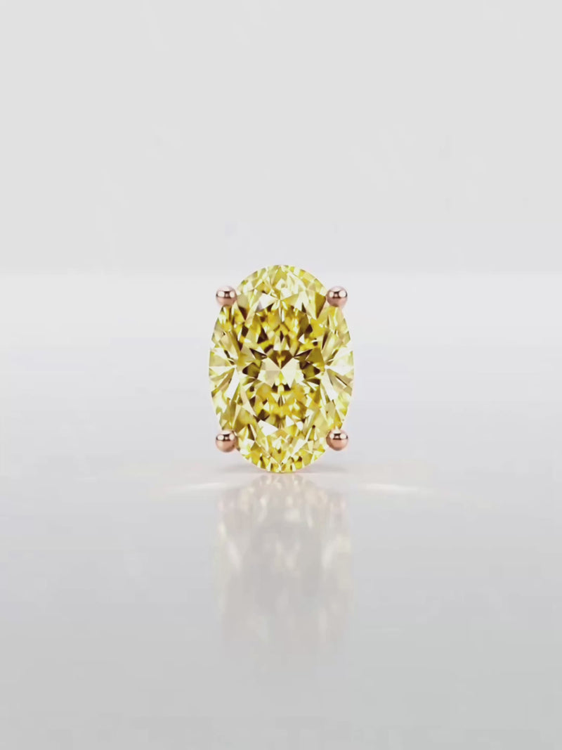 Video of the Fancy Yellow Oval Cut Lab-Grown Diamond Stud Earrings, showing sparkle and movement — Bow Tie Lab Diamonds