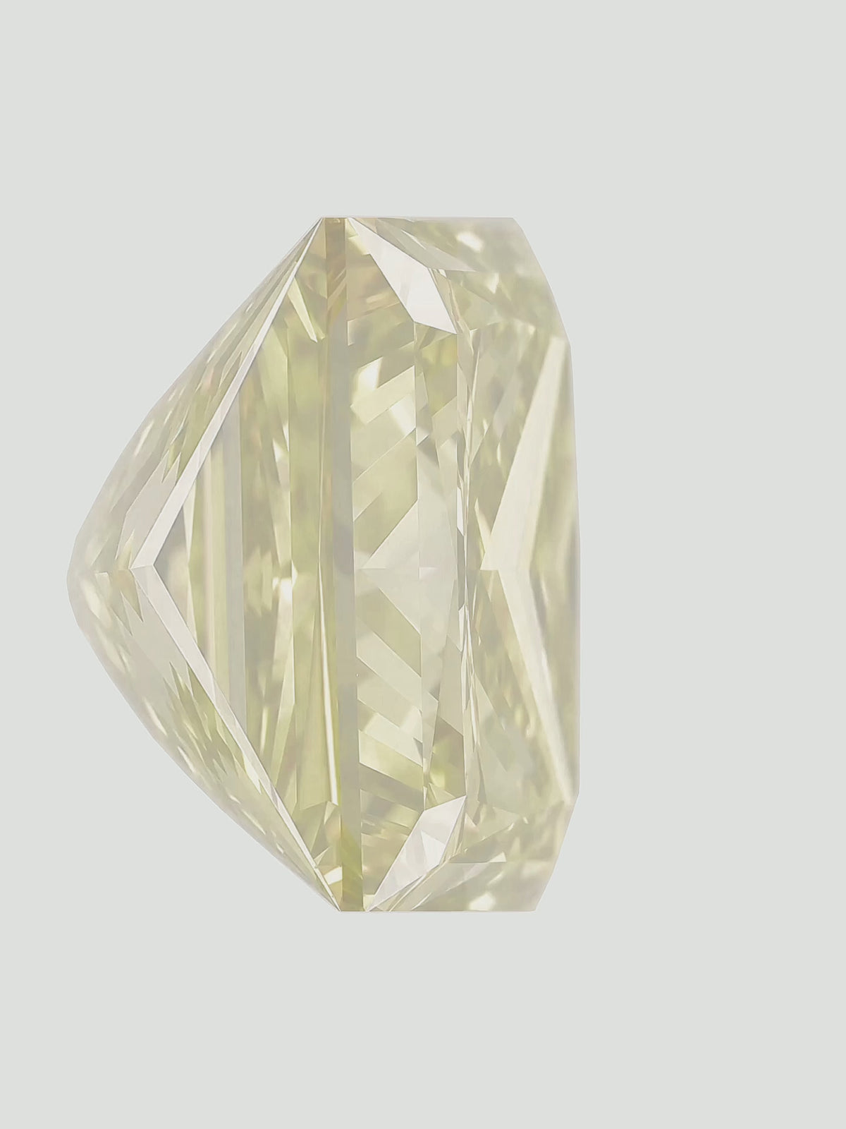 Load video: Rotating video of a fancy yellow princess cut lab-grown diamond showing its sparkle — Bow Tie Lab Diamonds