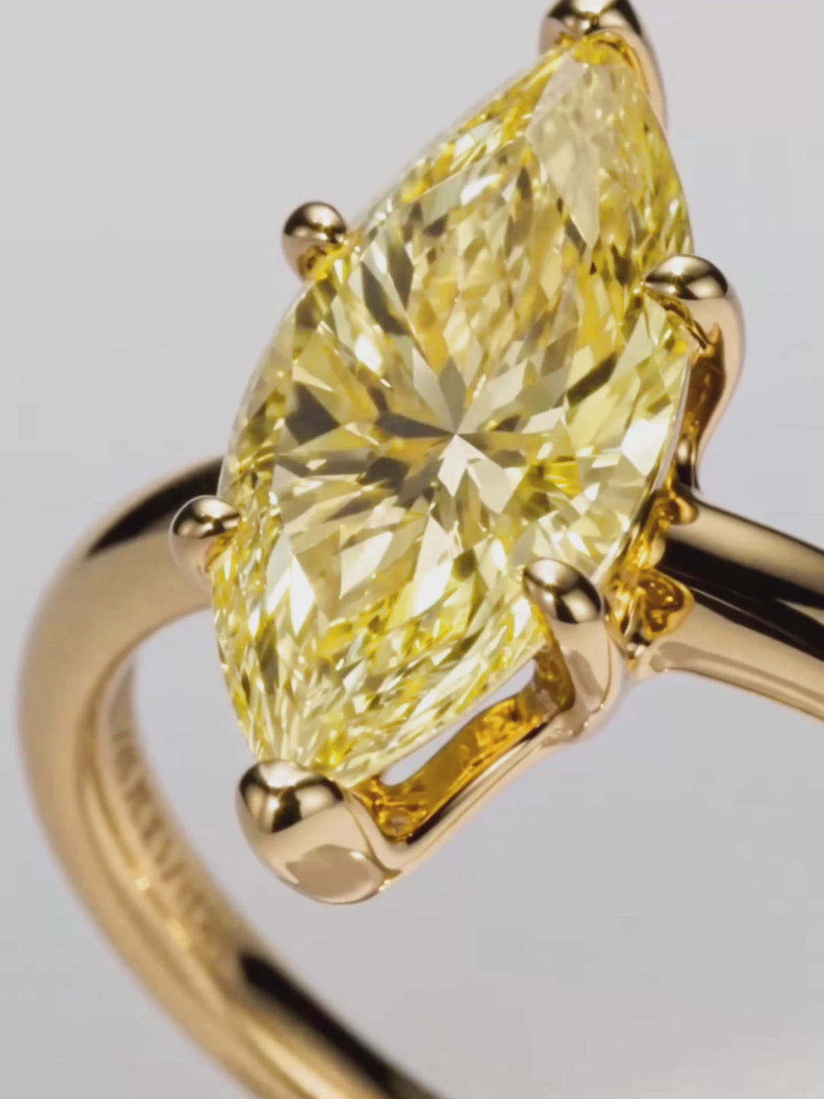 Load video: Video of the Fancy Yellow Marquise Cut Solitaire Lab-Grown Diamond Engagement Ring, showing sparkle and movement — Bow Tie Lab Diamonds