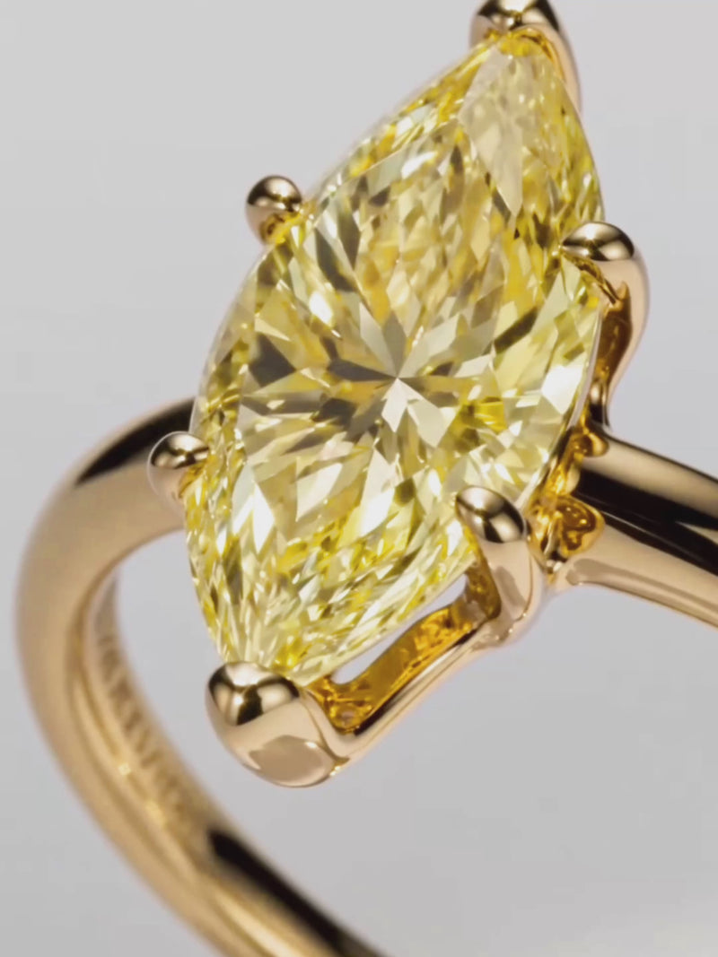 Video of the Fancy Yellow Marquise Cut Solitaire Lab-Grown Diamond Engagement Ring, showing sparkle and movement — Bow Tie Lab Diamonds