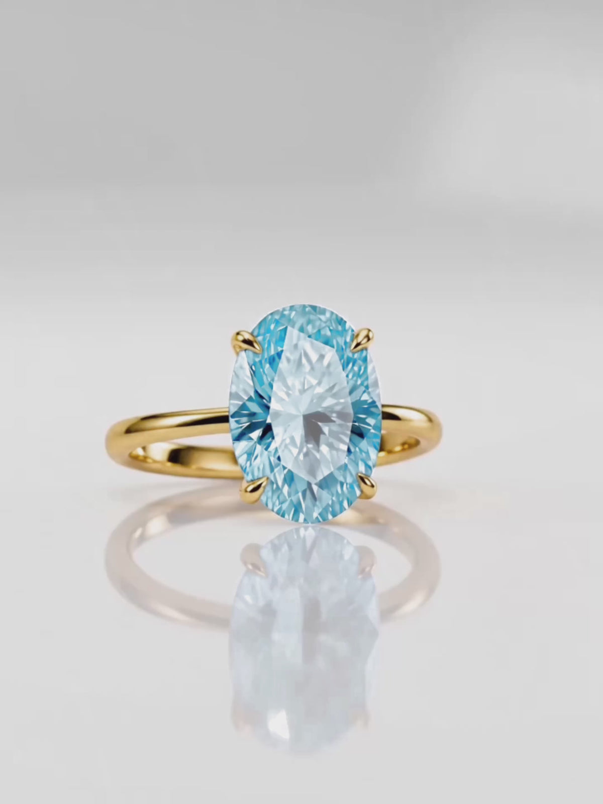 Load video: Video of the Fancy Blue Oval Cut Solitaire Lab-Grown Diamond Engagement Ring, showing sparkle and movement — Bow Tie Lab Diamonds