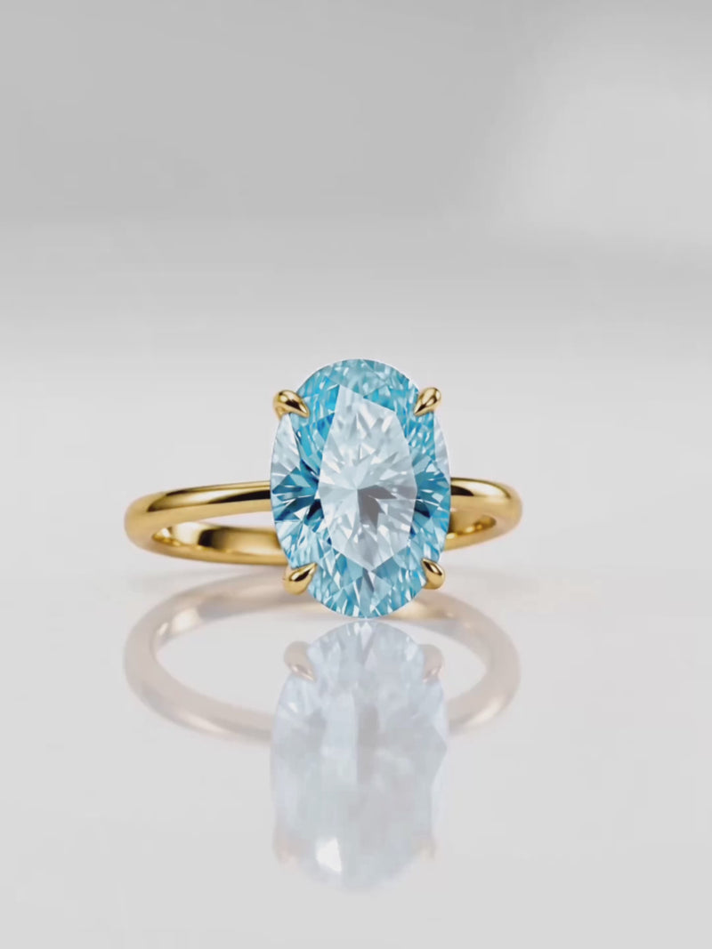 Video of the Fancy Blue Oval Cut Solitaire Lab-Grown Diamond Engagement Ring, showing sparkle and movement — Bow Tie Lab Diamonds