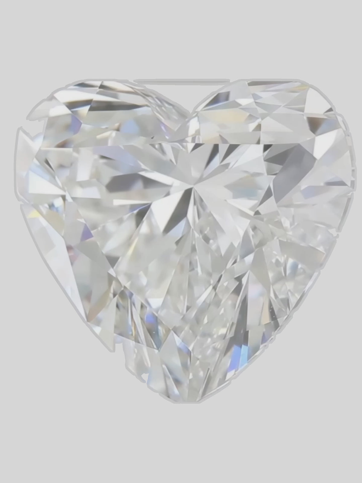 Load video: Rotating video of a colorless heart cut lab-grown diamond showing its sparkle — Bow Tie Lab Diamonds