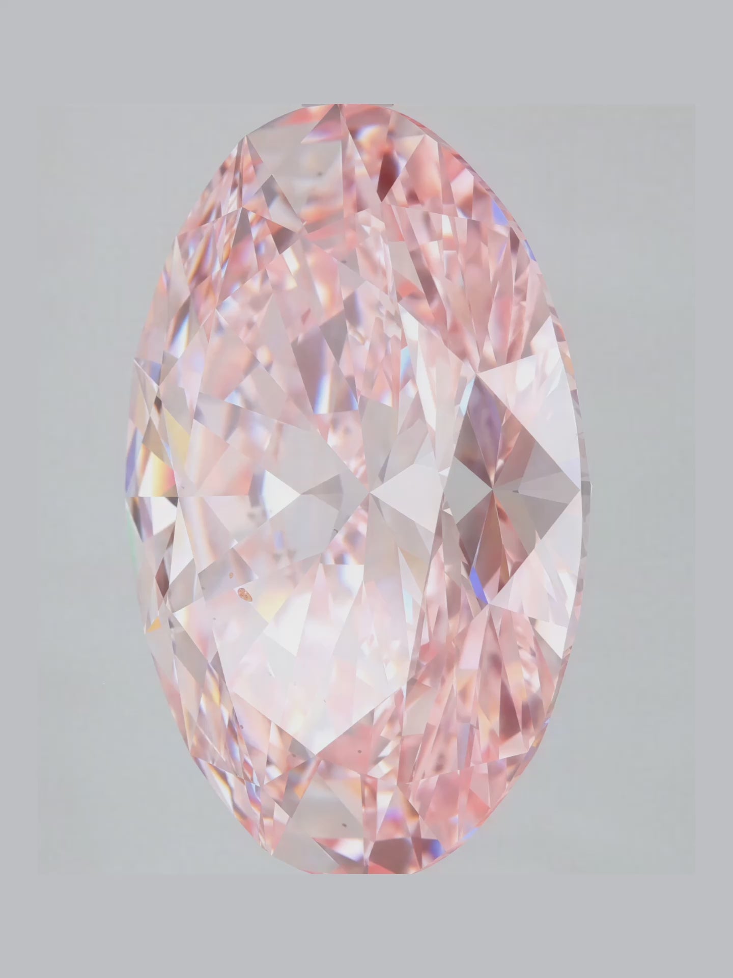 Load video: Fancy Pink Oval Cut Solitaire Lab Grown Diamond Engagement Ring