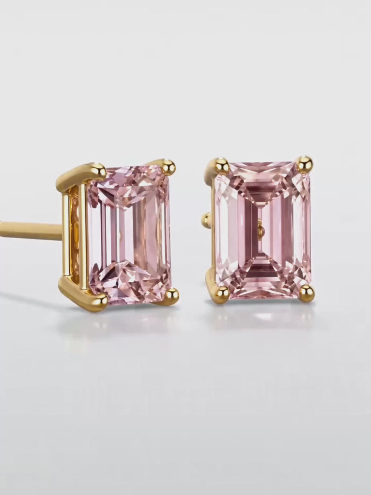 Load video: Video of the Fancy Pink Emerald Cut Lab-Grown Diamond Stud Earrings, showing sparkle and movement — Bow Tie Lab Diamonds