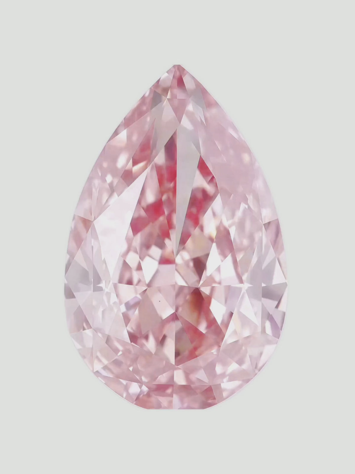 Load video: Rotating video of a fancy pink pear cut lab-grown diamond showing its sparkle — Bow Tie Lab Diamonds