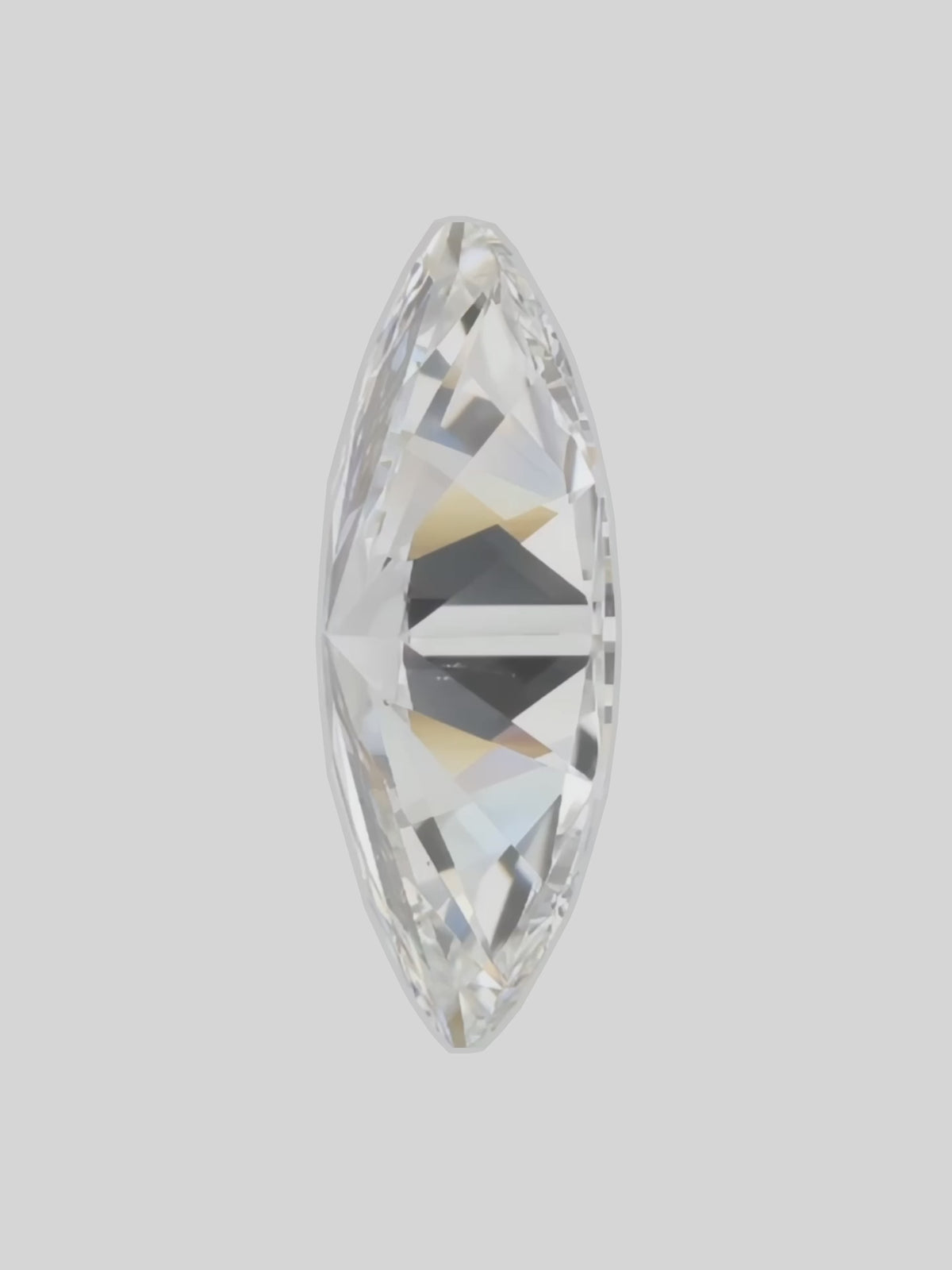 Load video: Rotating video of a colorless marquise cut lab-grown diamond showing its sparkle — Bow Tie Lab Diamonds