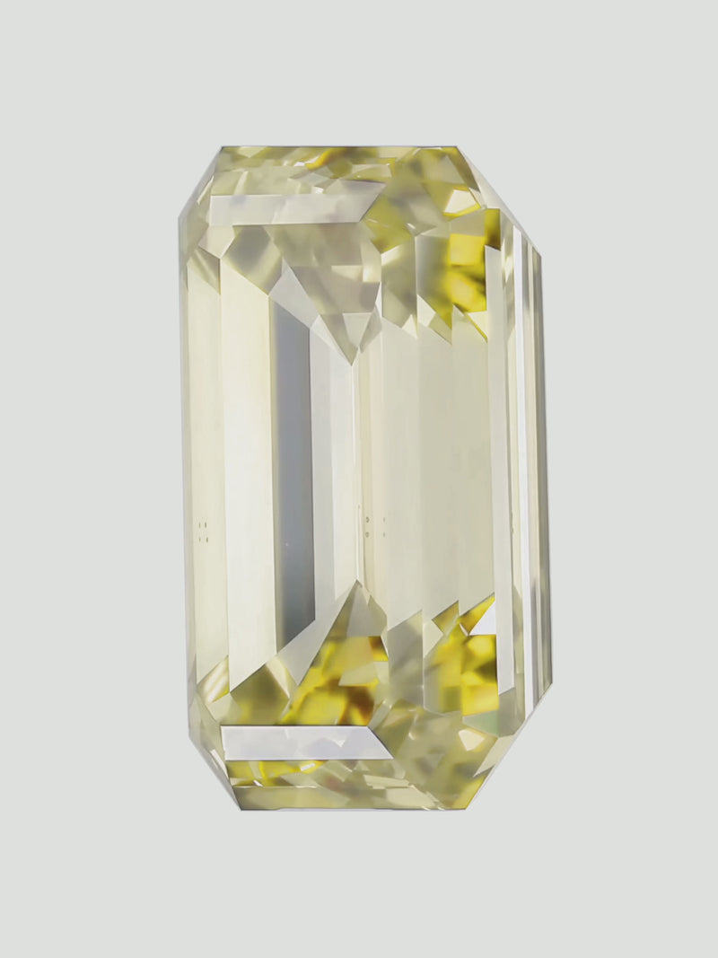Rotating video of a fancy yellow emerald cut lab-grown diamond showing its sparkle — Bow Tie Lab Diamonds