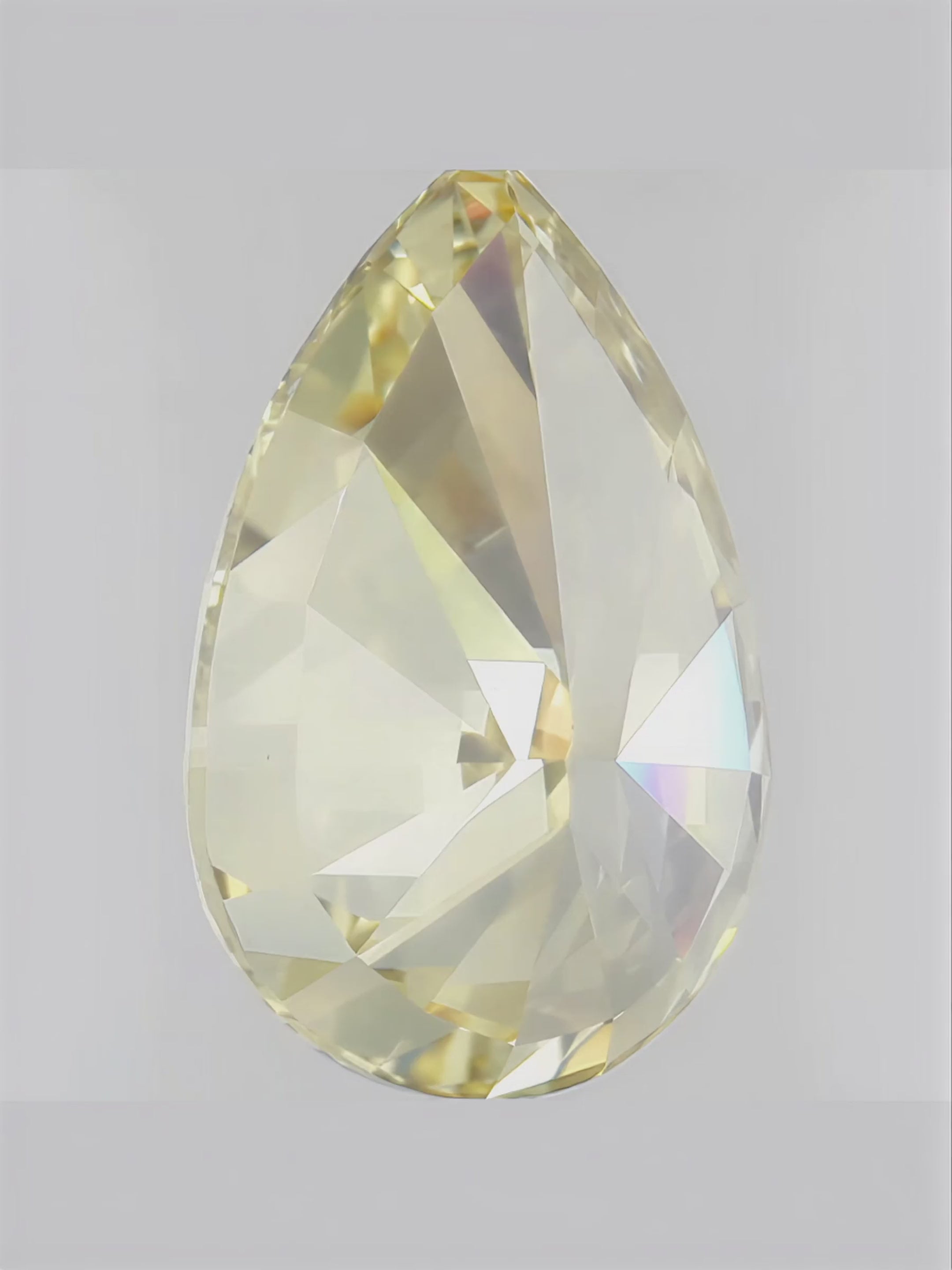 Load video: Fancy Yellow Pear Cut Lab Grown Diamond Stud Earrings
