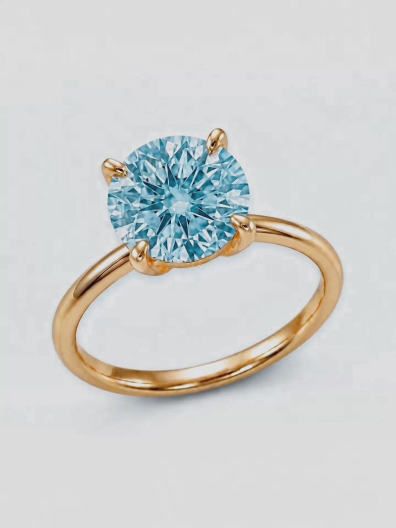 Video of the Fancy Blue Round Cut 4-Prong Solitaire Lab-Grown Diamond Engagement Ring, showing sparkle and movement — Bow Tie Lab Diamonds