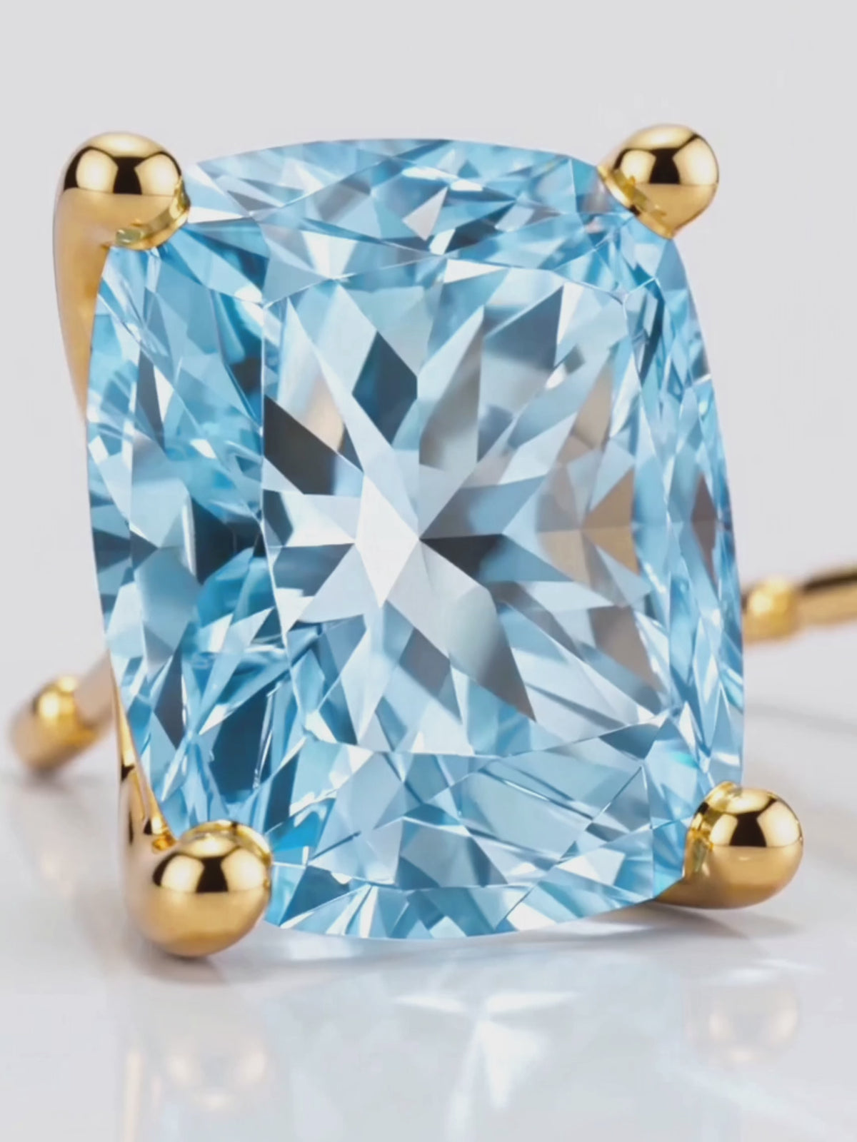 Load video: Video of the Fancy Blue Cushion Cut Lab-Grown Diamond Stud Earrings, showing sparkle and movement — Bow Tie Lab Diamonds